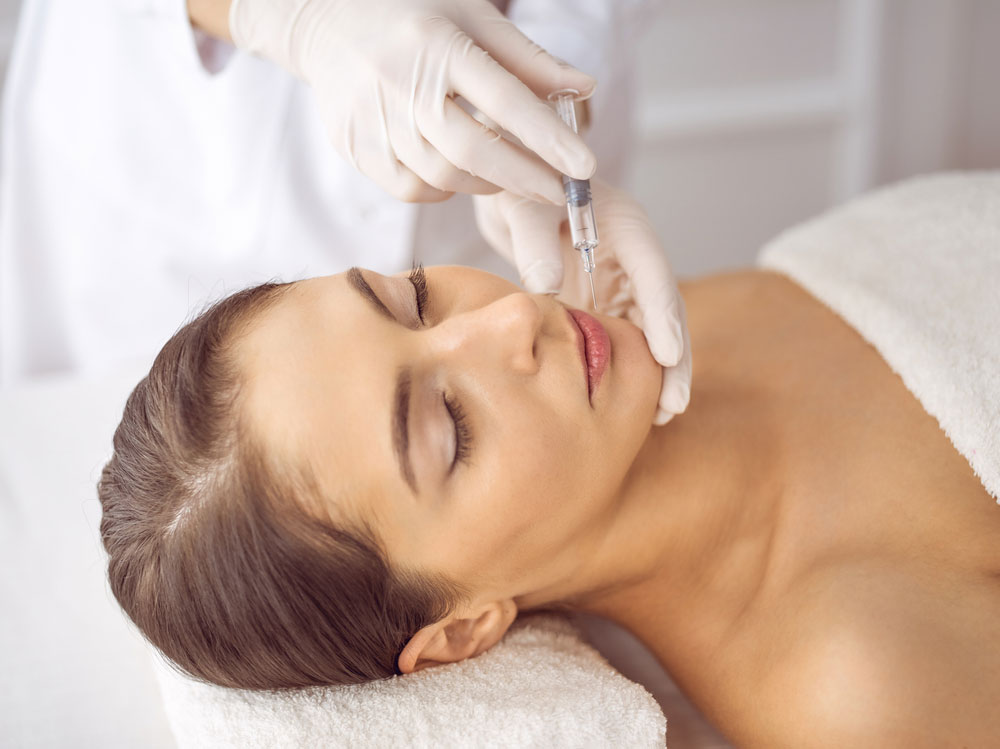 Woman receiving botox injection