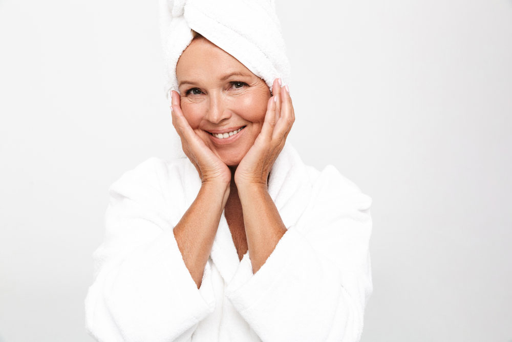 Woman in bathrobe ready for the spa